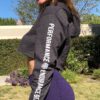 cropped women's hoody grey side view with PEG logo