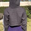 cropped women's hoody grey back view with PEG logo